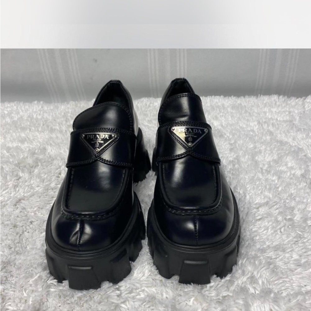 Prada women’s Glossy Black Loafers with Chunky Sole
